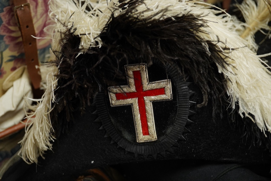 American Order of the Temple uniform, once the property of Theodore Trombly. Condition - coat and hats good, feathers and belt worn, fringed sash good, case worn